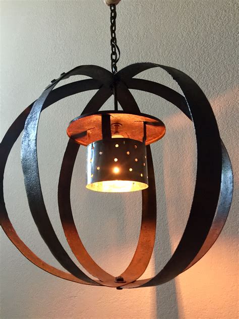 Quarter wine barrel hanging mason jar lamp. Wine barrel strap lamp with old roof vent shade | Ceiling ...