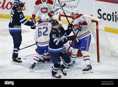 winnipeg jets kyle connor 81 celebrates scoring against montreal canadiens goaltender carey