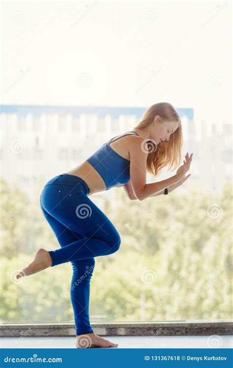 Practicing Balancing Yoga Stock Photo Image Of Indoor 131367618