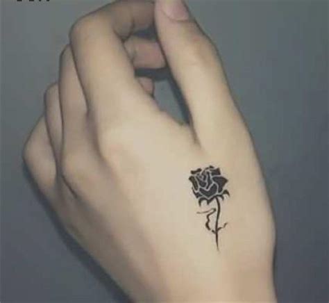 The cute tattoo is perfect for the hand just below the elbow on the opposite side. Cute Small Rose Hand Tattoo | Venice Tattoo Art Designs