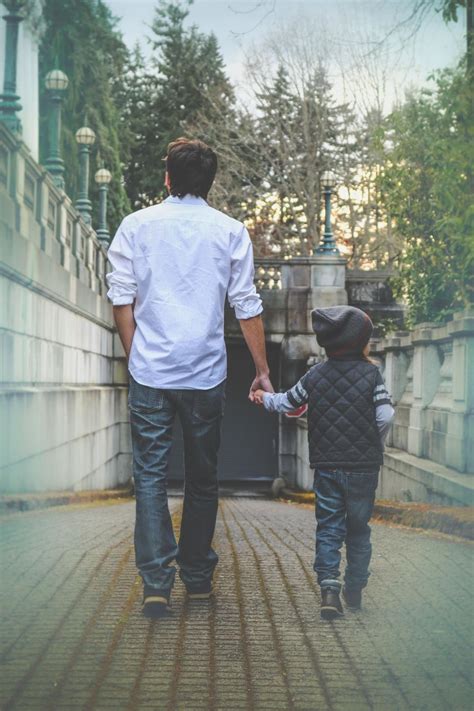 Free Stock Photo Of Back View Of Father And Son Walking Together