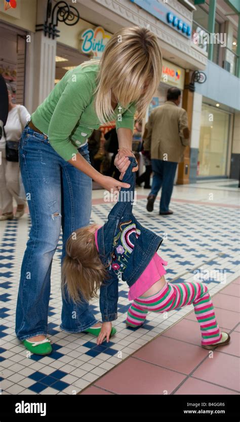 Little Girl Having A Tantrum In A Shopping Centre Stock Photo Alamy