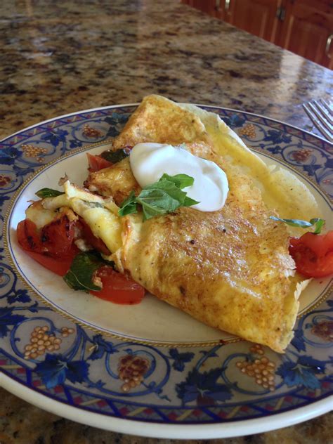 This is where an easy pasta with tomato cream sauce recipe comes in handy. Tomato basil omelet with sour cream. | Food, Breakfast ...