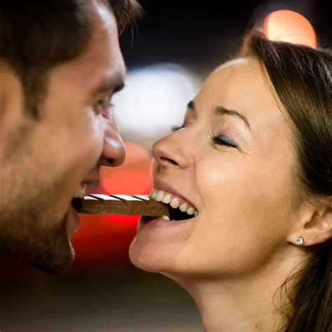 Couple Eating Chocolate On Date Travel Off Path