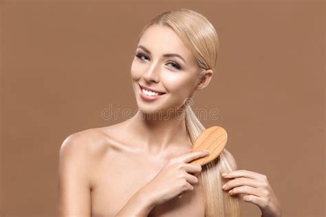 Charming Blonde Naked Woman Combing Long Hair Stock Image Image Of Attractive Elegant