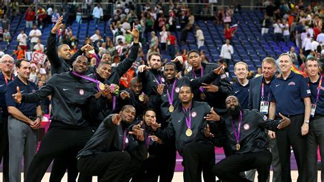 Gold Medallists The United States Pose Following The Victory Ceremony For The Men S Basketball