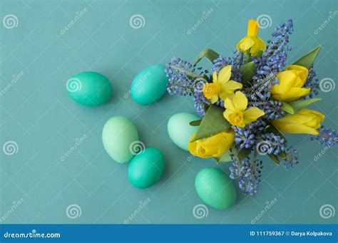 Bouquet Of Daffodils Tulips And Muscarieaster Easter Eggs Are Blue