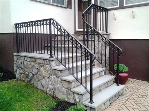 Wrought iron handrails capture a timeless design, perfect for any home or building. Decorative Wrought Iron Railing | Outdoor stair railing ...