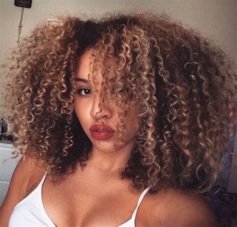 23 Best Curly Hairstyles For Black Women To Enhance Beauty