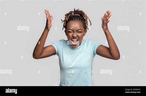 Mad Young Black Woman Screaming And Gesturing Stock Photo Alamy