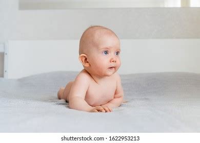 Naked Sleepy Baby Girl On Light Stock Photo Edit Now 1654618342