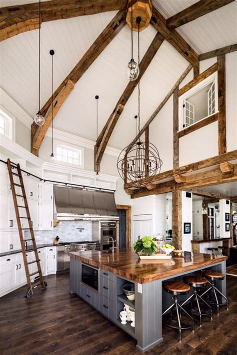 A chandelier and pendant lighting. 25 Vaulted Ceiling Ideas With Pros And Cons - DigsDigs