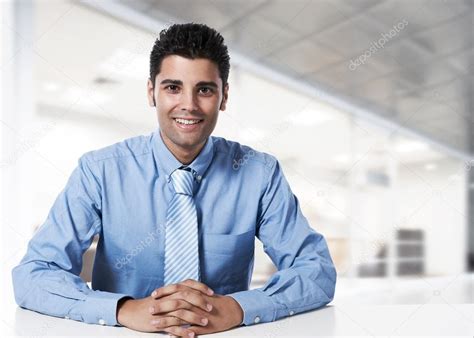 Young Successful Business Man At Office — Stock Photo © Scornejor 19288743