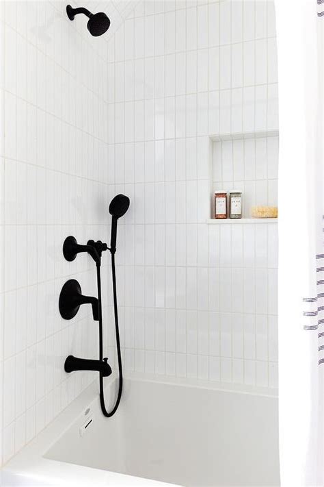 Horizontally stacked subway tiles work beautifully with modern designs and open shelving, creating aesthetic lines throughout the space. Matte Black Shower Kit with White Vertical Stacked Tiles ...