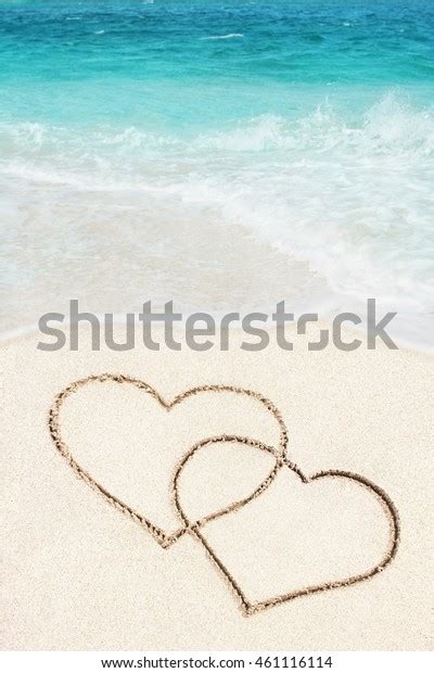 Two Hearts Handwritten On Sandy Beach Stock Photo Edit Now 461116114