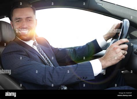 Portrait Of Confident Businessman Driving A Car Stock Photo Alamy