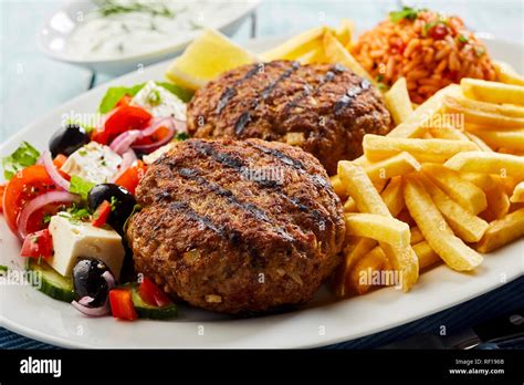 Traditional Bifteki Minced Beef Meat Balls With Fresh Greek Salad