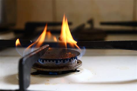Orange Flame On The Gas Stove Causes And Fixes Howdykitchen
