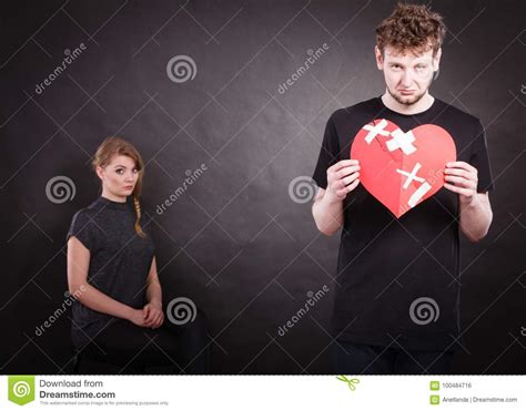 Sad Couple Holds Broken Heart Stock Photo Image Of Broken Break