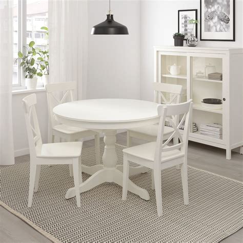 A table is a type of furniture comprising an open, flat surface supported by a base or legs. INGATORP Extendable table, white, Max. length: 61" - IKEA ...