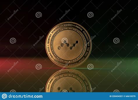 Nano Crypto Coin Placed On Reflective Surface And Lit With Green And Red Lights Stock Image