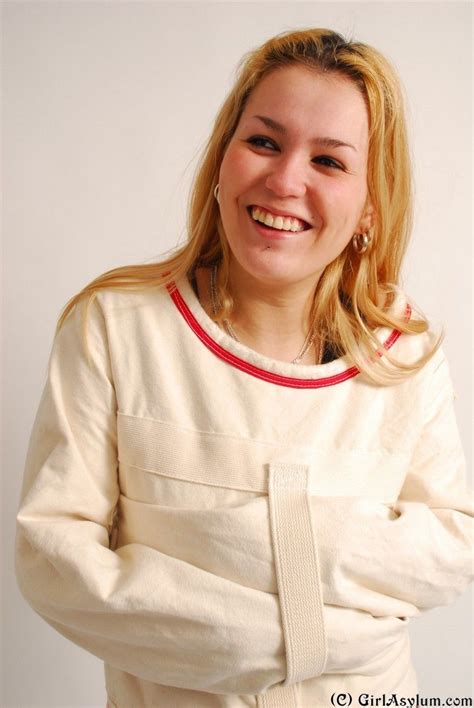 Smiling Woman Feels Well Wearing A Straitjacket