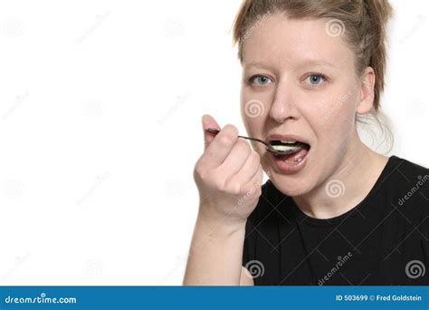 Woman Eating With Spoon Stock Image Image Of Calories 503699