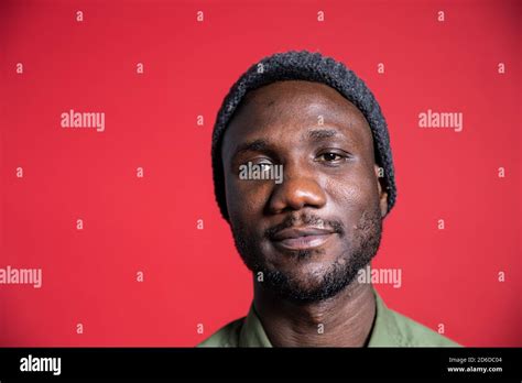 Face Portrait Of Young Black Man Looking At Camera Close Up Isolated