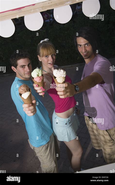 Teenagers Posing With Ice Cream Stock Photo Alamy