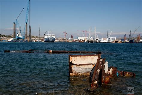 Greece Hauls Abandoned Half Sunken Ships Out Of The Sea — Ap Images