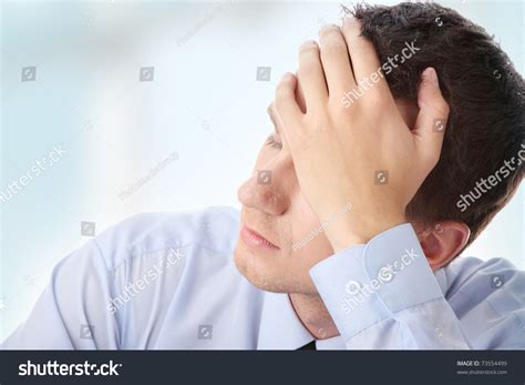 Businessman In Depression With Hand On Forehead Stock Photo 73554499
