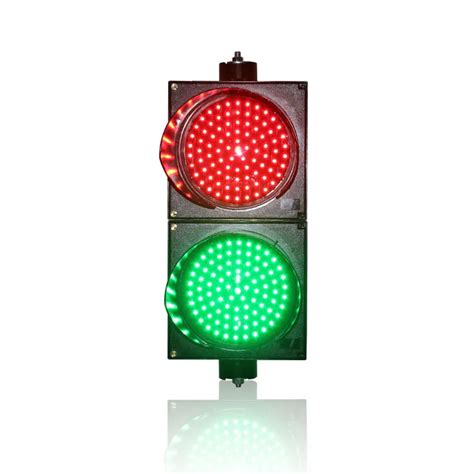 Traffic Light With Green Light 2021 And Red 2020 On Sky Background