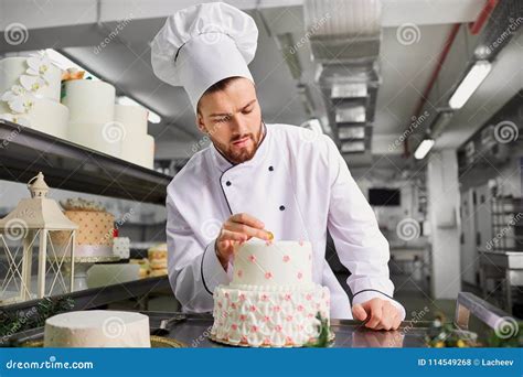 Confectioner With A Cake In The Bakery Stock Photo Image Of Sweet