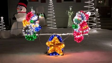 See Saw Christmas Lighted Moving Decoration — Stock Video © Loganimages