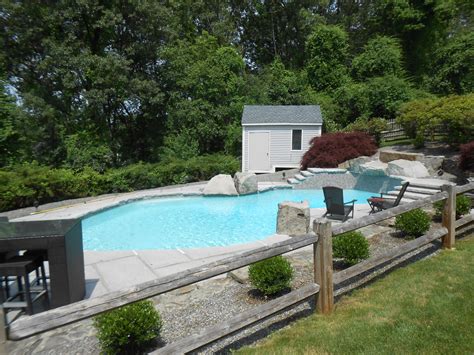 Great Combination Of Hardscape And Landscape Swimming Pool House