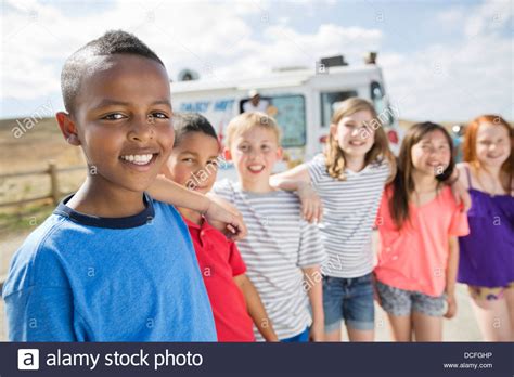 Group Portrait Of Kids Standing Together Stock Photo Alamy