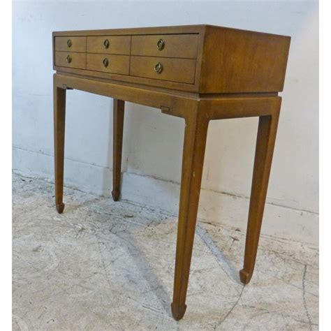 With two adjustable shelves and three drawers, this versatile console provides lots of hidden storage for the dining room,. Walnut 1960s Narrow Credenza or Console Cabinet by Fine ...