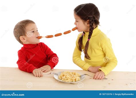 Little Children Sharing The Chain Of Sausages Stock Photo Image 18713376