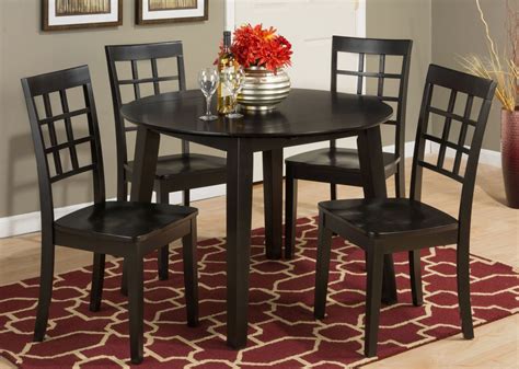 These tables look very elegant, perfect for the dining room. Simplicity Espresso Extendable Round Drop-Leaf Dining Room ...