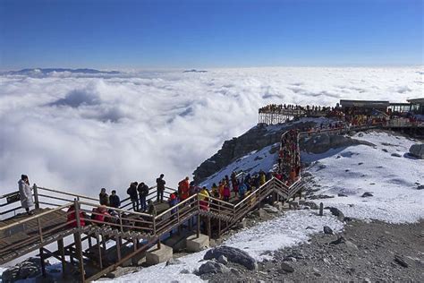 Tourists On Jade Dragon Snow Mountain Yulong Xueshan