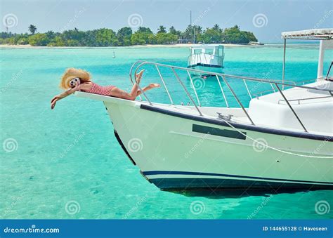 Woman In Red Bikini Lying On Boat Bow Stock Photo Image Of Straw