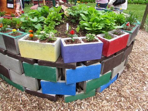 Enrich your new soil with a slow release fertilizer. How to Build A Raised Bed Garden Out Of Cinder Blocks