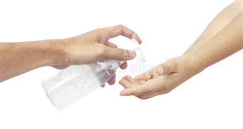 Man Using Squeezing Hand Sanitizer To Palm Kid Sanitizing Hands To