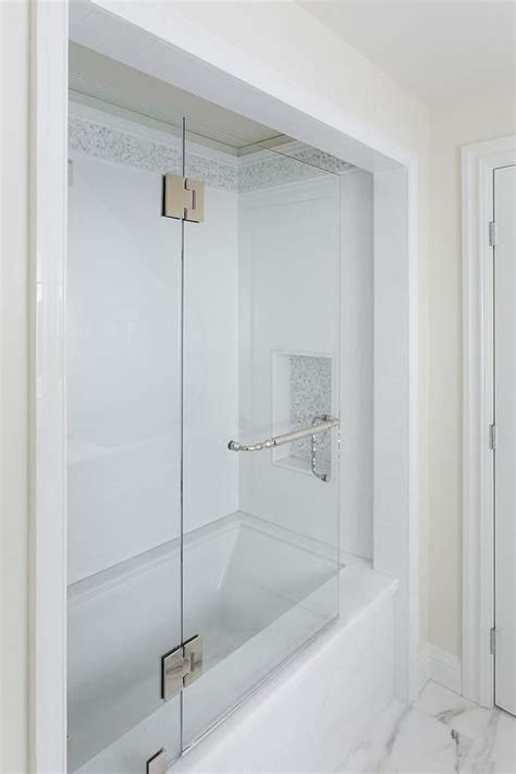 Amazing gallery of interior design and decorating ideas of arched bathtub alcove in living rooms, bathrooms, kitchens by elite black and white bathroom features an arched alcove filled with white subway tiles mixed with white square. Guest bathroom features an alcove filled with a marble ...
