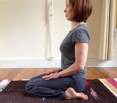 Roll your shoulder blades away from your ears. 6 Yoga Poses To Soothe Your Lower Back Pain | Trainer
