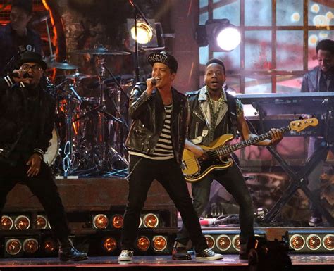 Bruno Mars Brings The Passion To His Performance Of Treasure Brit
