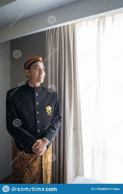 Asian Man Wearing Traditional Clothes Of Indonesian Beskap Stock Image