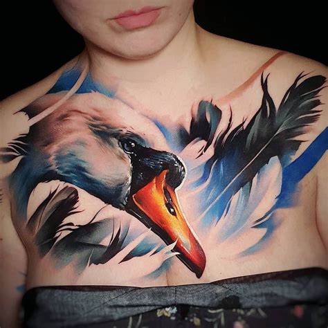 This is a pretty cool tattoo of the mask of batman. Swan Chest Tattoo