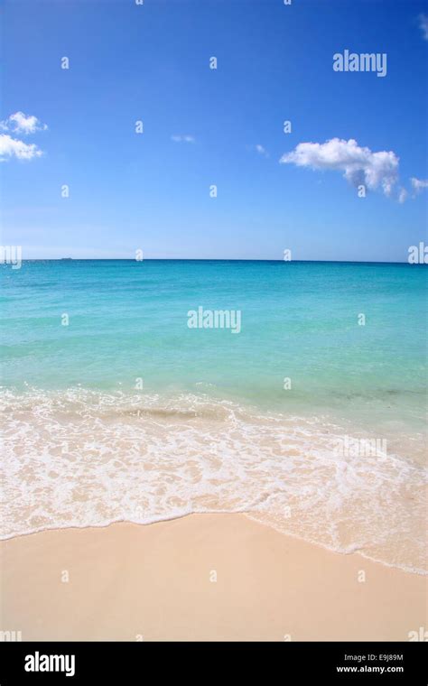 Beautiful White Sand Beach With Turquoise Sea And Blue Sky Manchebo