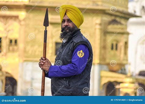 View Of A Sikh Devotee As Holy Guard In The Golden Temple Shri